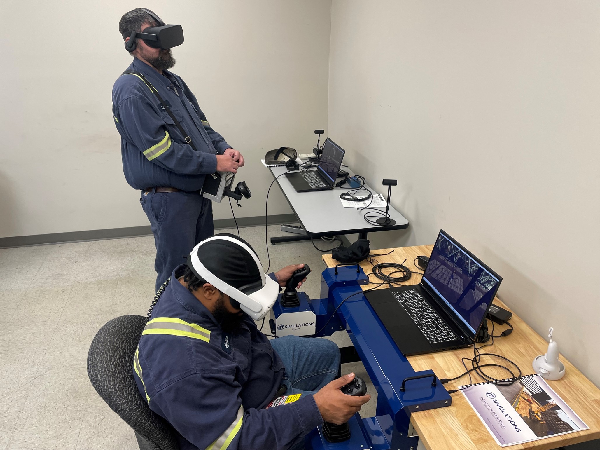 Two men using VR headsets with additional controls joysticks.